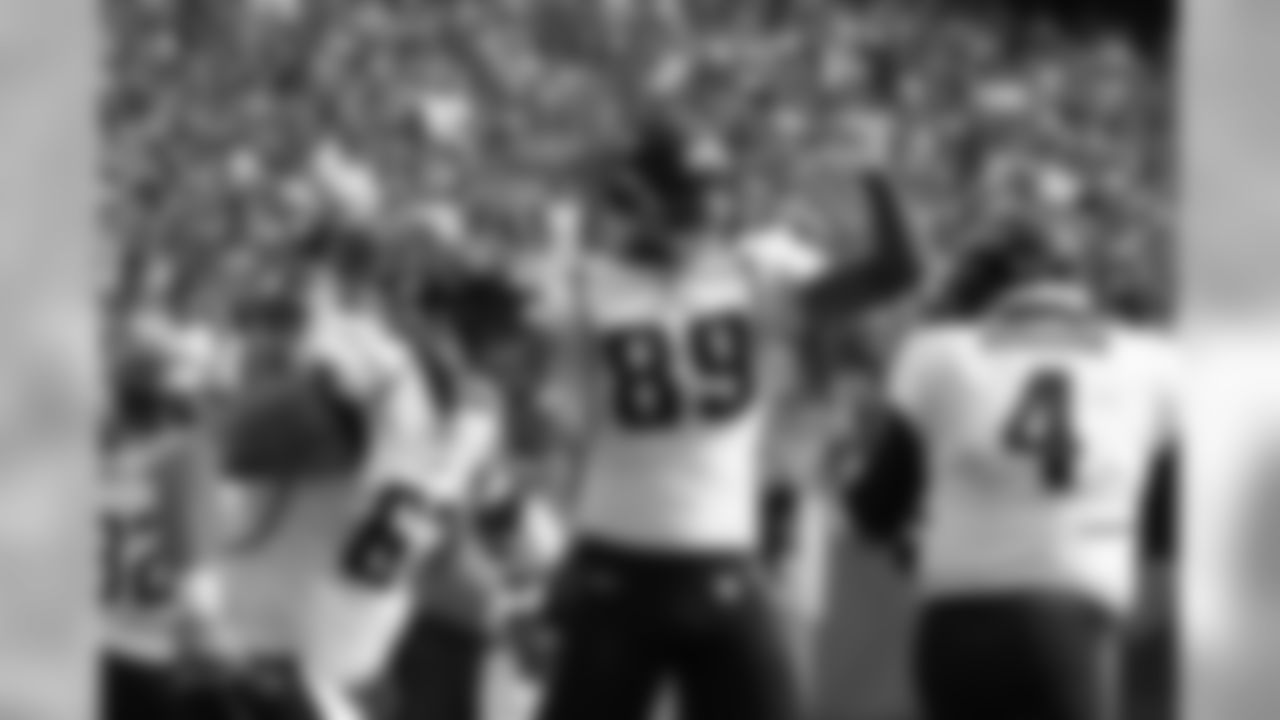 63 Brad Meester, #89 Marcedes Lewis, #4 Todd Bouman