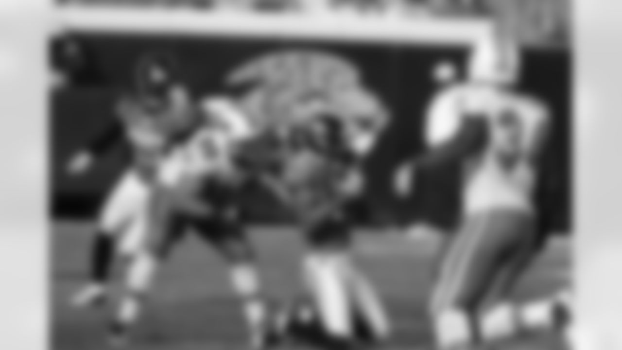 21 Derek Cox, #25 Reggie Nelson