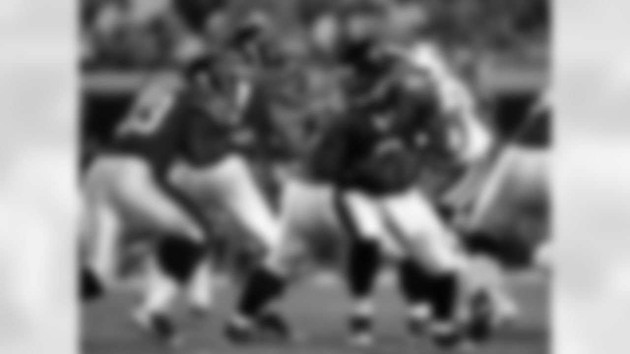 33 Greg Jones, #9 David Garrard