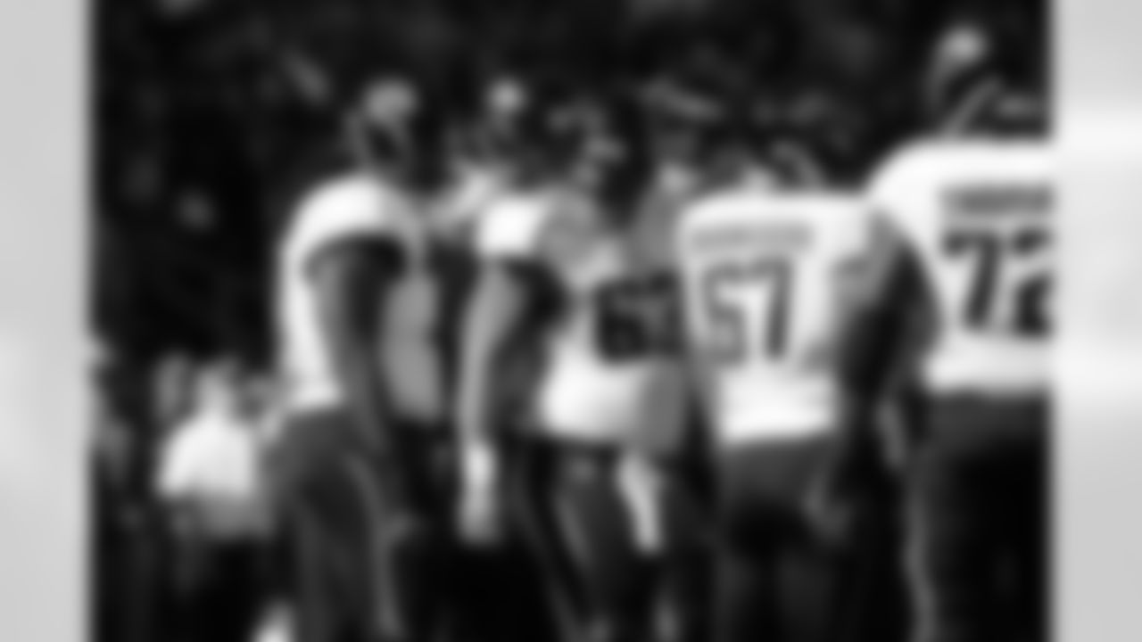 63 Brad Meester, #67 Vince Manuwai, #72 Tra Thomas