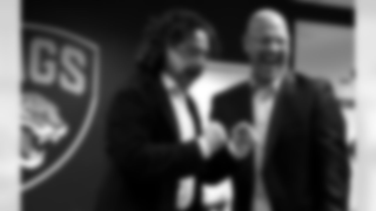 Jaguars Owner Shad Khan and Head Coach Gus Bradley celebrate the selection.