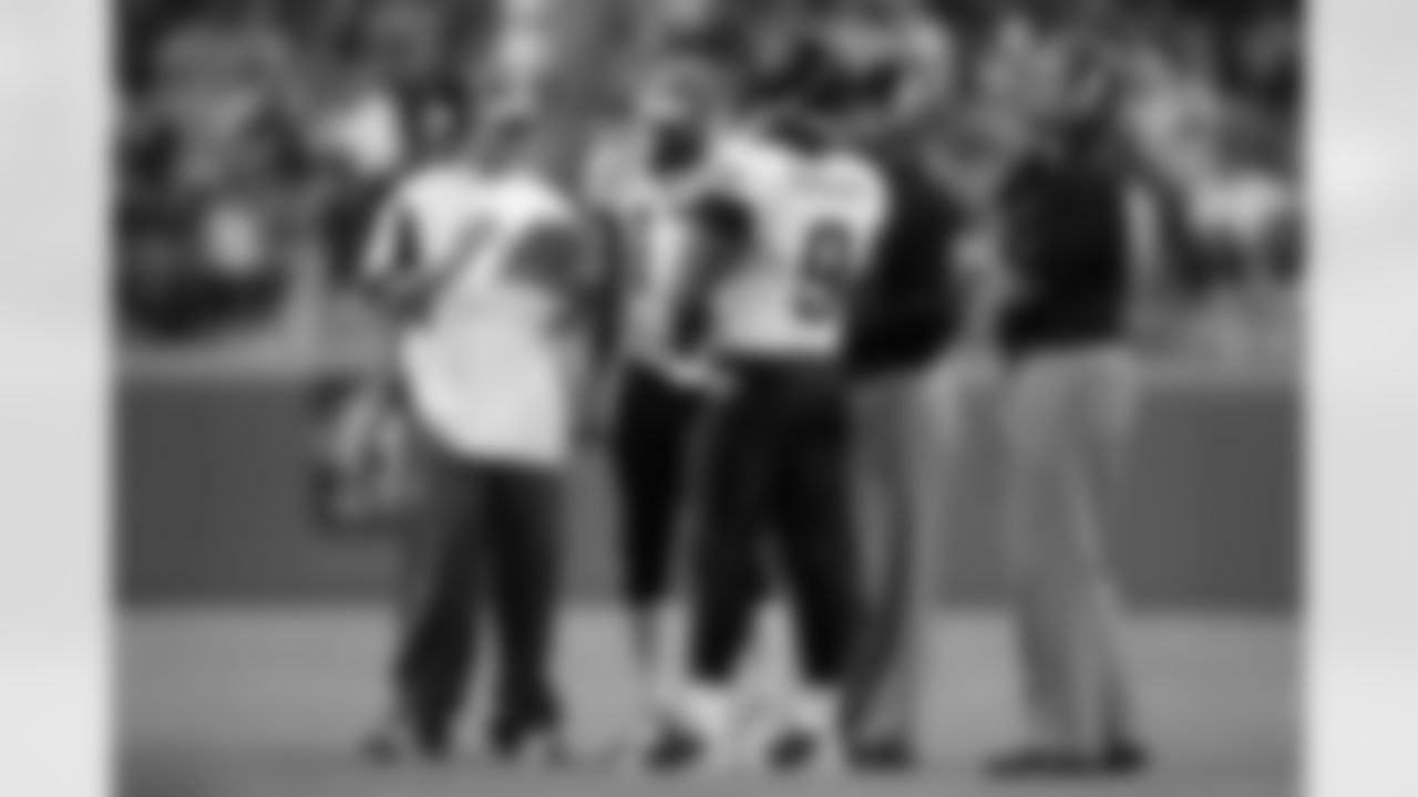 12 Paul Smith, #17 Cleo Lemon, #9 David Garrard, Mike Shula, Jack Del Rio