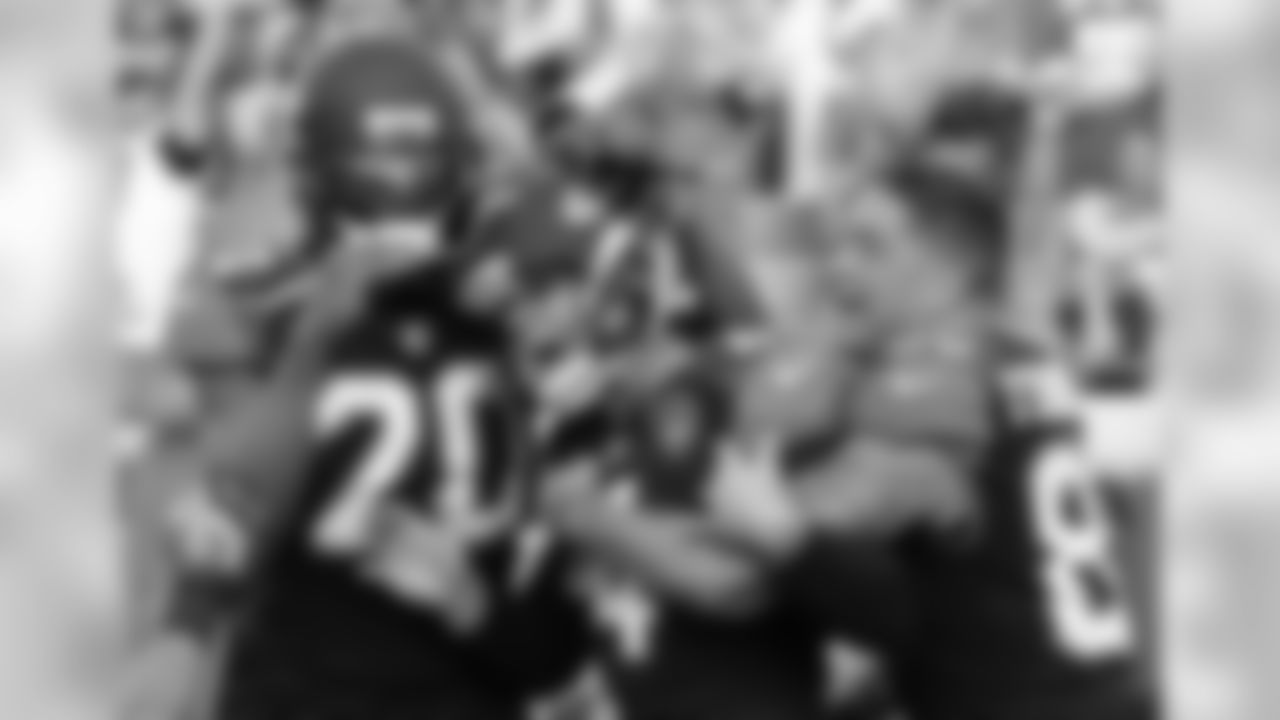 Jacksonville Jaguars kicker Josh Lambo, center, celebrates his winning 30-yard field goal against the Los Angeles Chargers with teammates cornerback Jalen Ramsey (20) and tight end James O'Shaughnessy, right, at an NFL football game, Sunday, Nov. 12, 2017, in Jacksonville, Fla. (AP Photo/Stephen B. Morton)