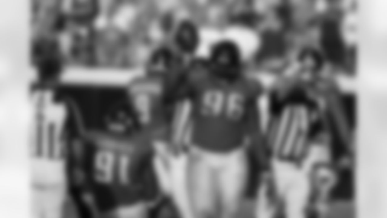 91 Derrick Harvey, #9 David Garrard, #96 Terrance Knighton