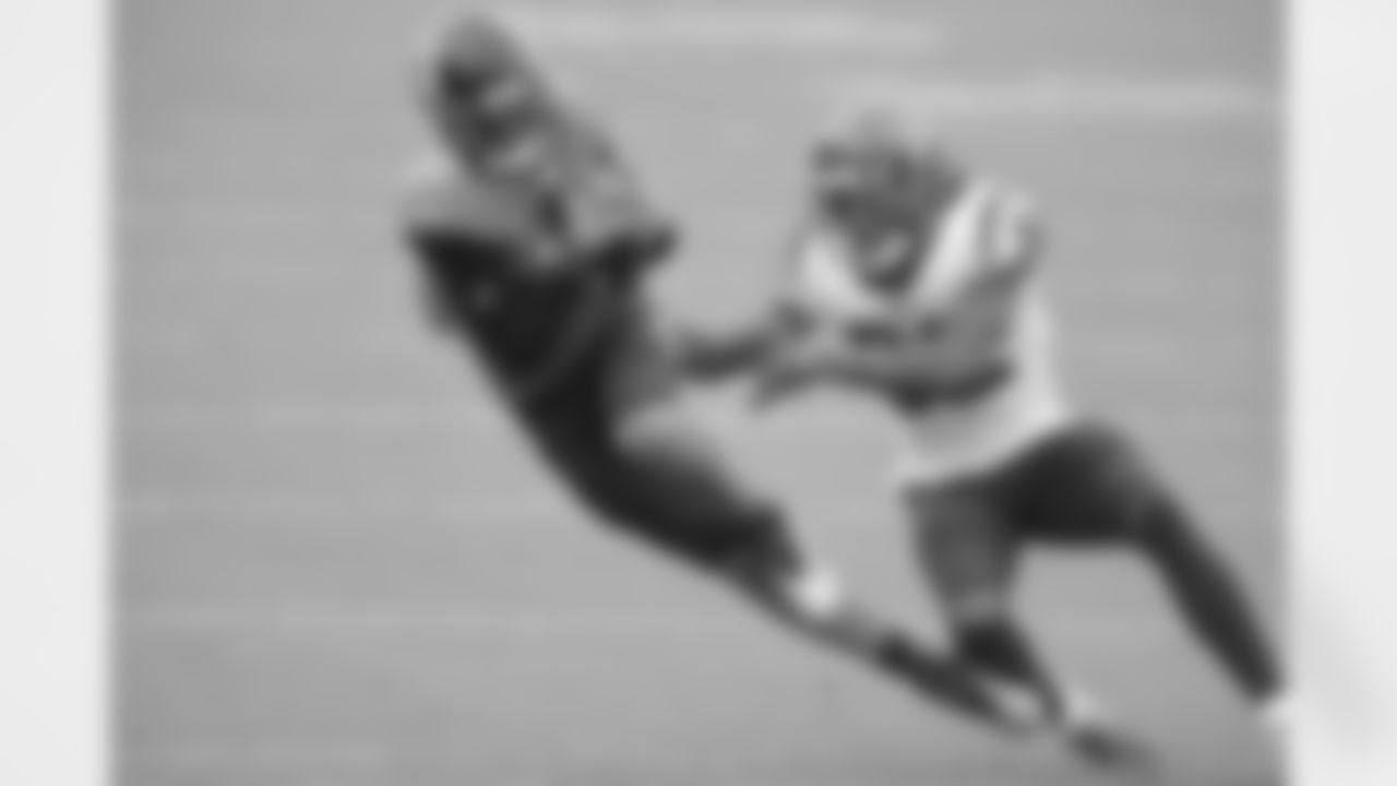 Jacksonville Jaguars receiver DJ Chark Jr. (17) makes a catch behind Houston Texans safety Lonnie Johnson Jr. (32) during an NFL football game, Sunday, Nov. 8, 2020 in Jacksonville, Fla.
