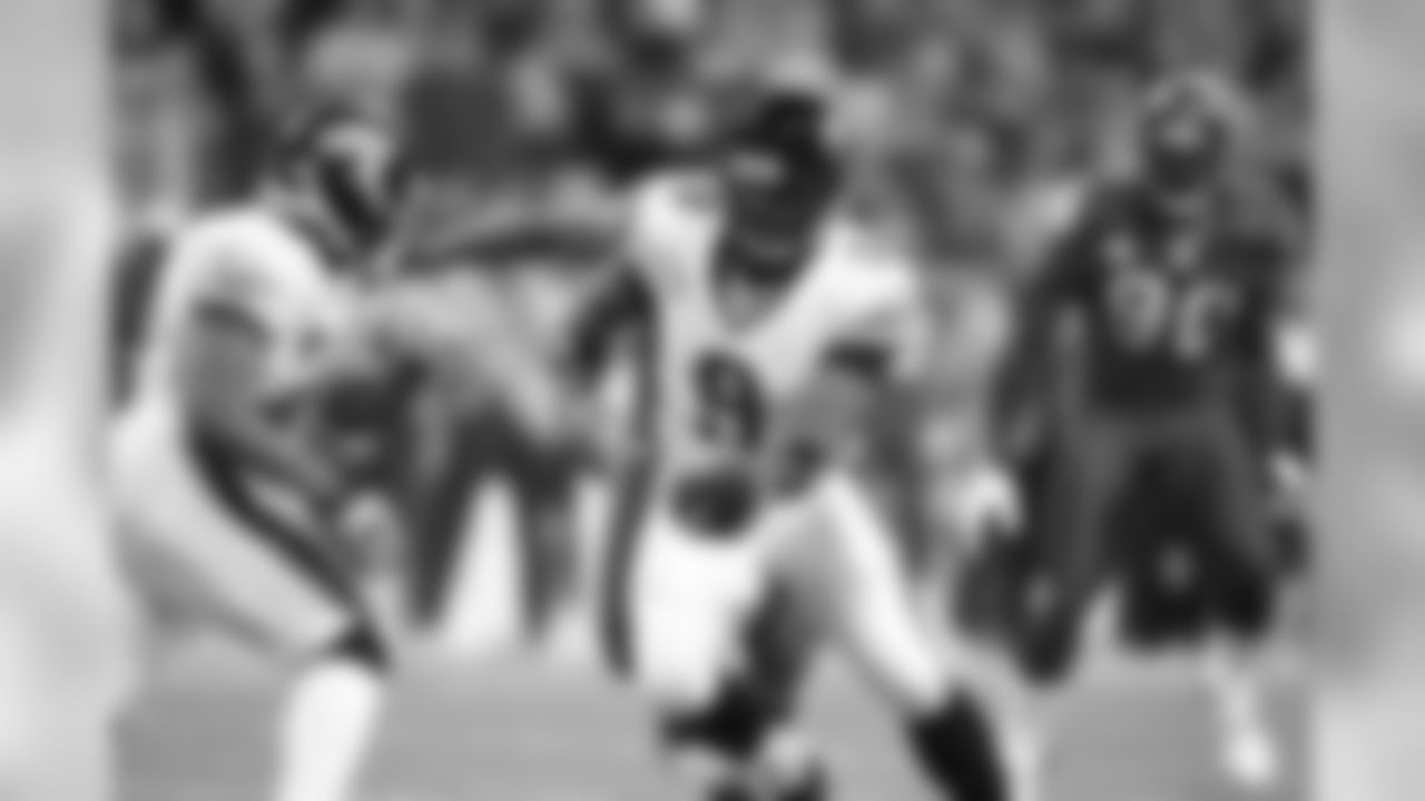 28 Fred Taylor, #9 David Garrard