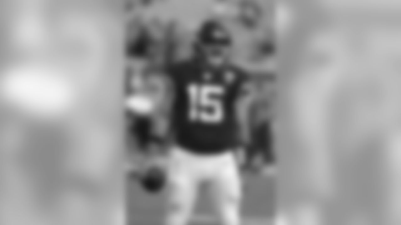 Jacksonville Jaguars quarterback Gardner Minshew laughs with teammates before an NFL football game against the Tampa Bay Buccaneers, Sunday, Dec. 1, 2019, in Jacksonville, Fla. (AP Photo/John Raoux)