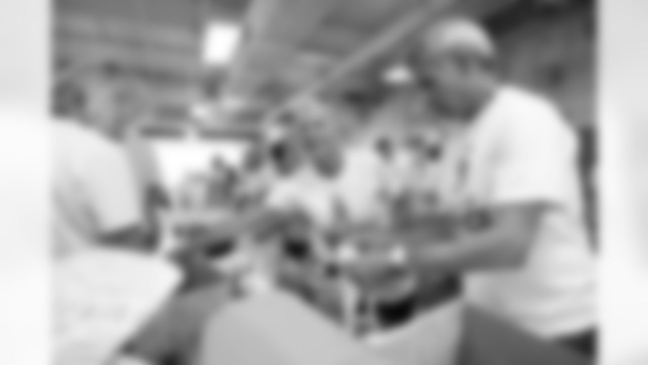 Nov. 4, 2021 - Novo Nordisk staff volunteer to stuff military care packages during Salute to Service month.