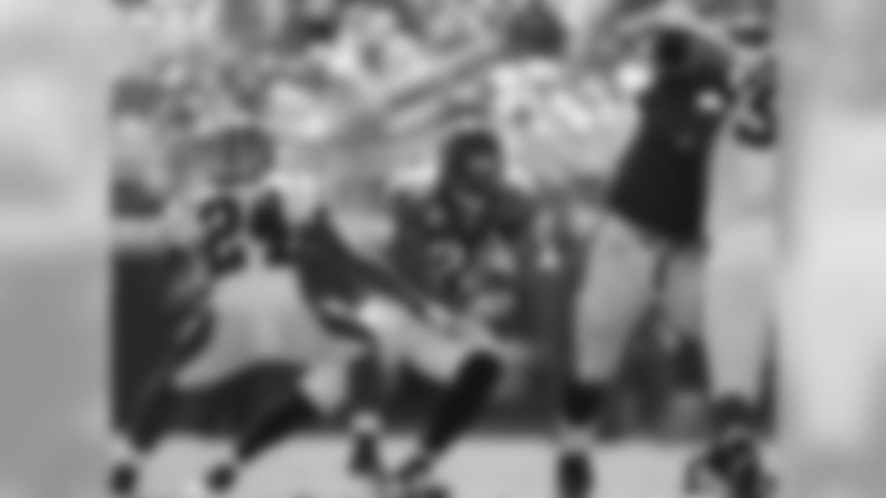 28 Fred Taylor, #79 Tony Pashos