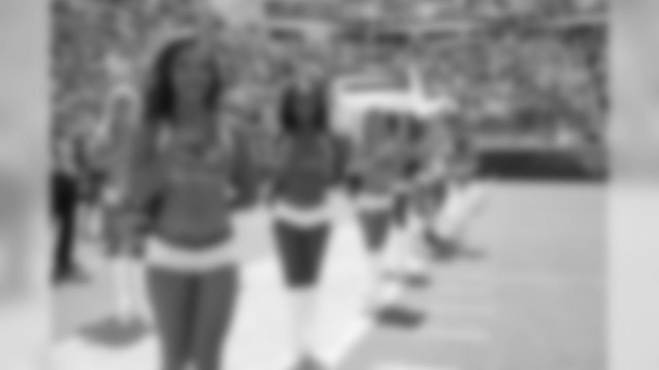 The Jacksonville Jaguars cheerleaders stand on the sideline during singing of the national anthem before an NFL football game against the Tennessee Titans Sunday, Sept. 23, 2018, in Jacksonville, Fla. (AP Photo/Phelan M. Ebenhack)