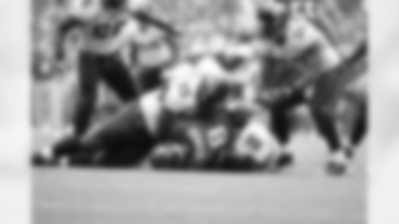 56 Justin Durant, #95 Montavious Stanley, #66 Derek Landri, #52 Daryl Smith