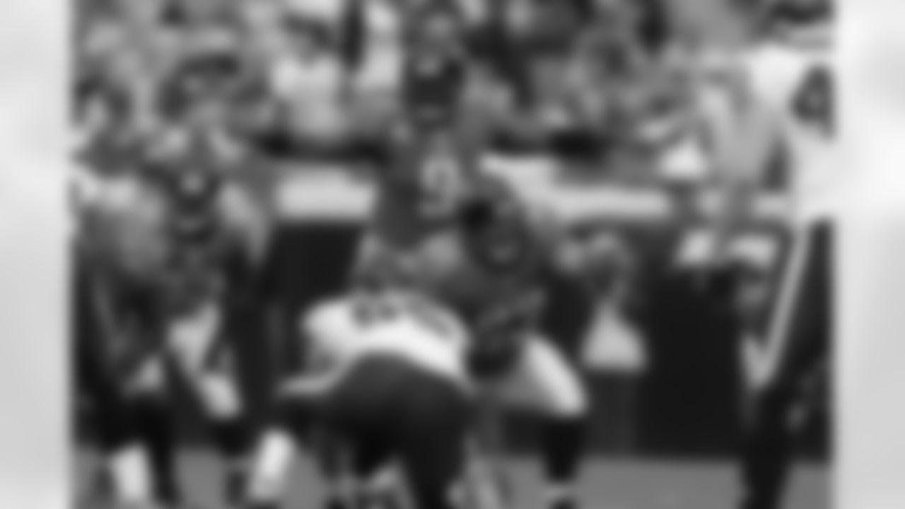 9 David Garrard, #63 Brad Meester