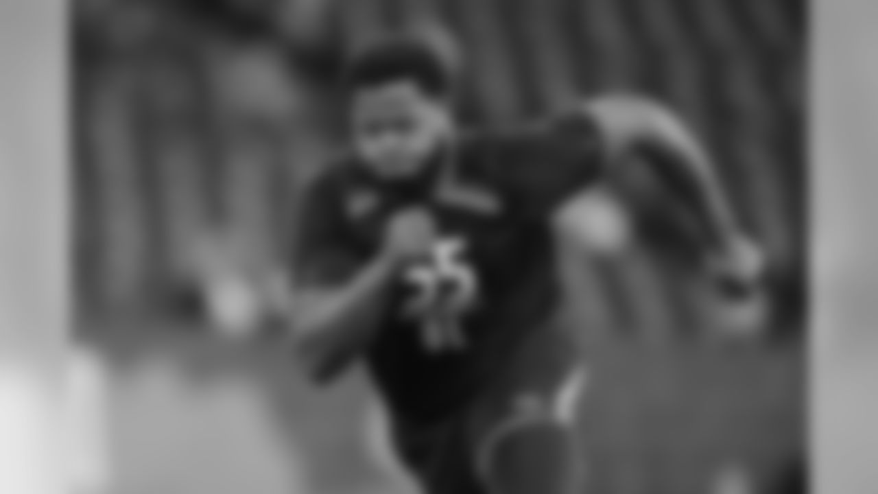 Florida offensive lineman Jawaan Taylor runs a drill at the NFL football scouting combine in Indianapolis, Friday, March 1, 2019. (AP Photo/Michael Conroy)
