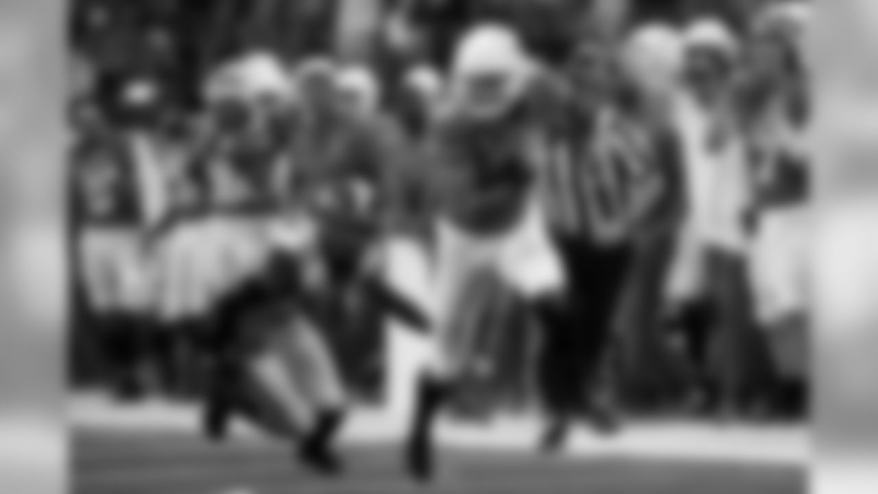 FILE - In this Dec. 1, 2018, file photo, Texas wide receiver Collin Johnson (9) runs as Oklahoma cornerback Parnell Motley (11) attempts a tackle during the first half of the NCAA Big 12 Conference football championship, in Arlington, Texas. Texas opens the 2019 season against Louisiana Tech of Conference USA on Saturday night, Aug. 31, 2019. (AP Photo/Roger Steinman, File)