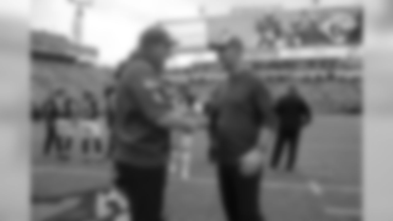 Jacksonville Jaguars head coach Doug Marrone, left, and Indianapolis Colts head coach Frank Reich chat on the field before an NFL football game Sunday, Dec. 2, 2018, in Jacksonville, Fla. (AP Photo/Phelan M. Ebenhack)