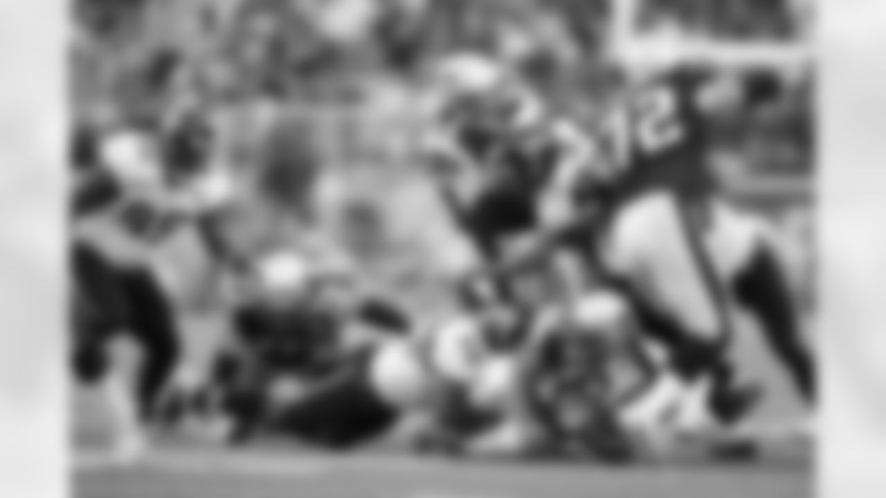 95 Terrance Knighton, #59 Brian Iwuh, #21 Derek Cox