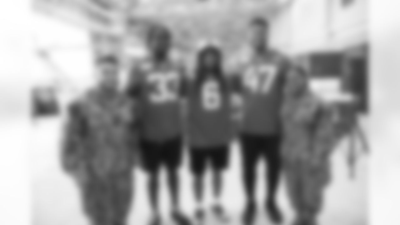 Jaguars LB Devin Lloyd (33), OLB De'Shaan Dixon (47) and CB Chris Claybrooks (6) tour NAS JAX military base on June 9, 2023.