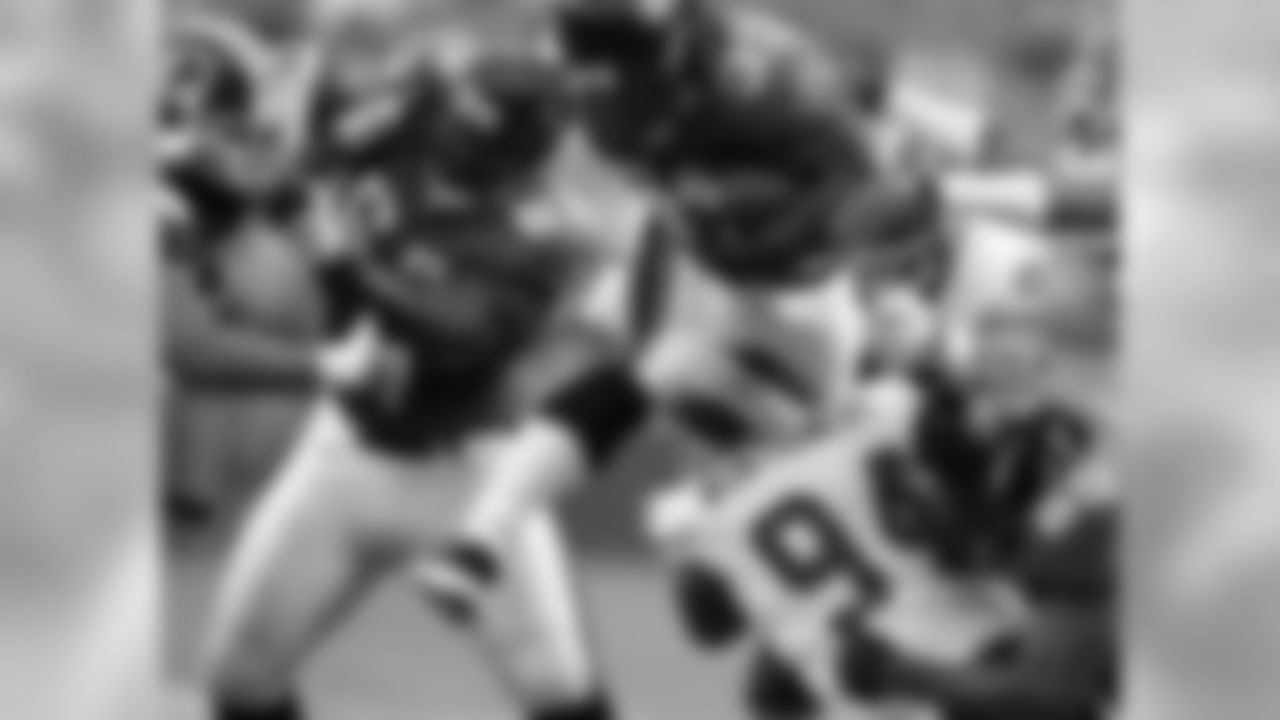 62 Dennis Norman, #33 Greg Jones, #69 Khalif Barnes