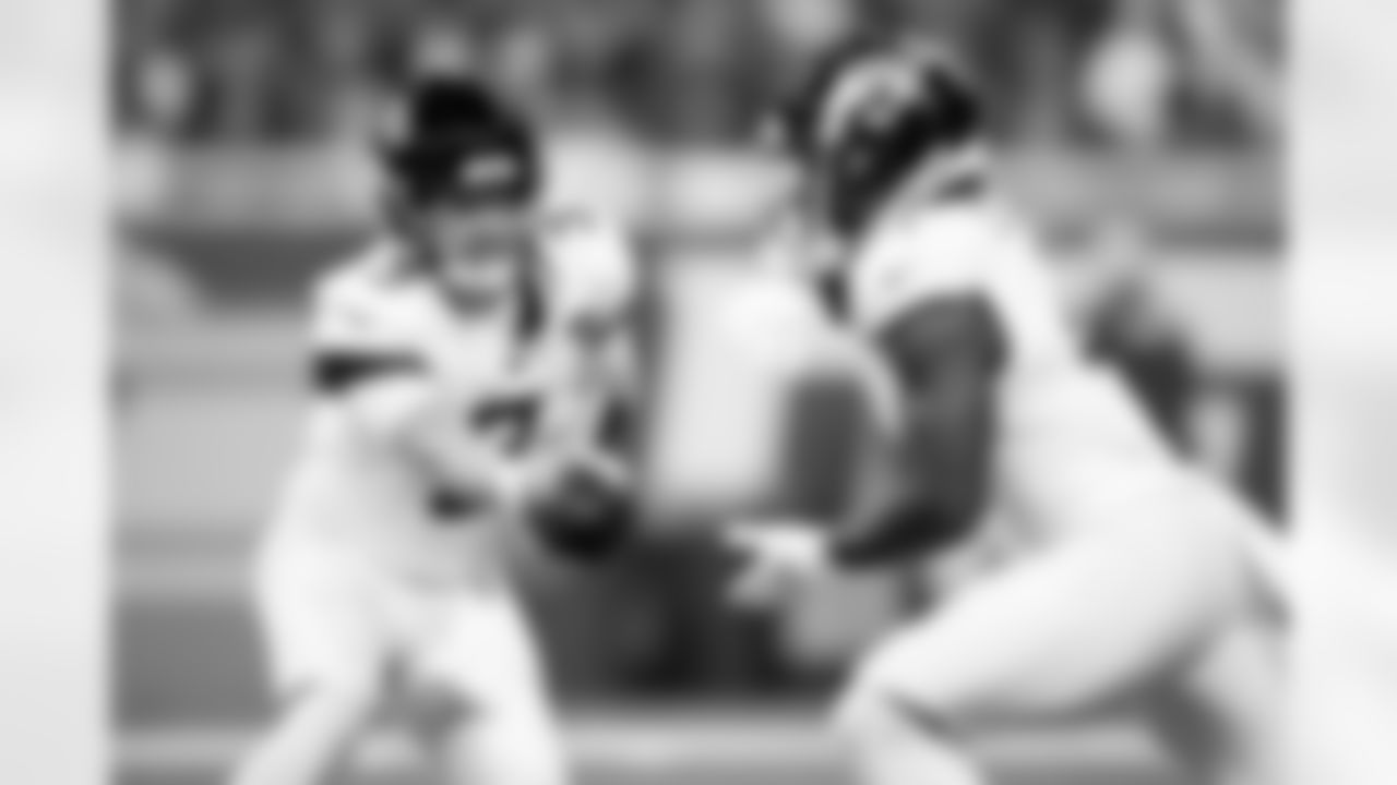 Jacksonville Jaguars vs. Detroit Lions\
QB C.J. Beathard (3) and RB Tank Bigsby (4)