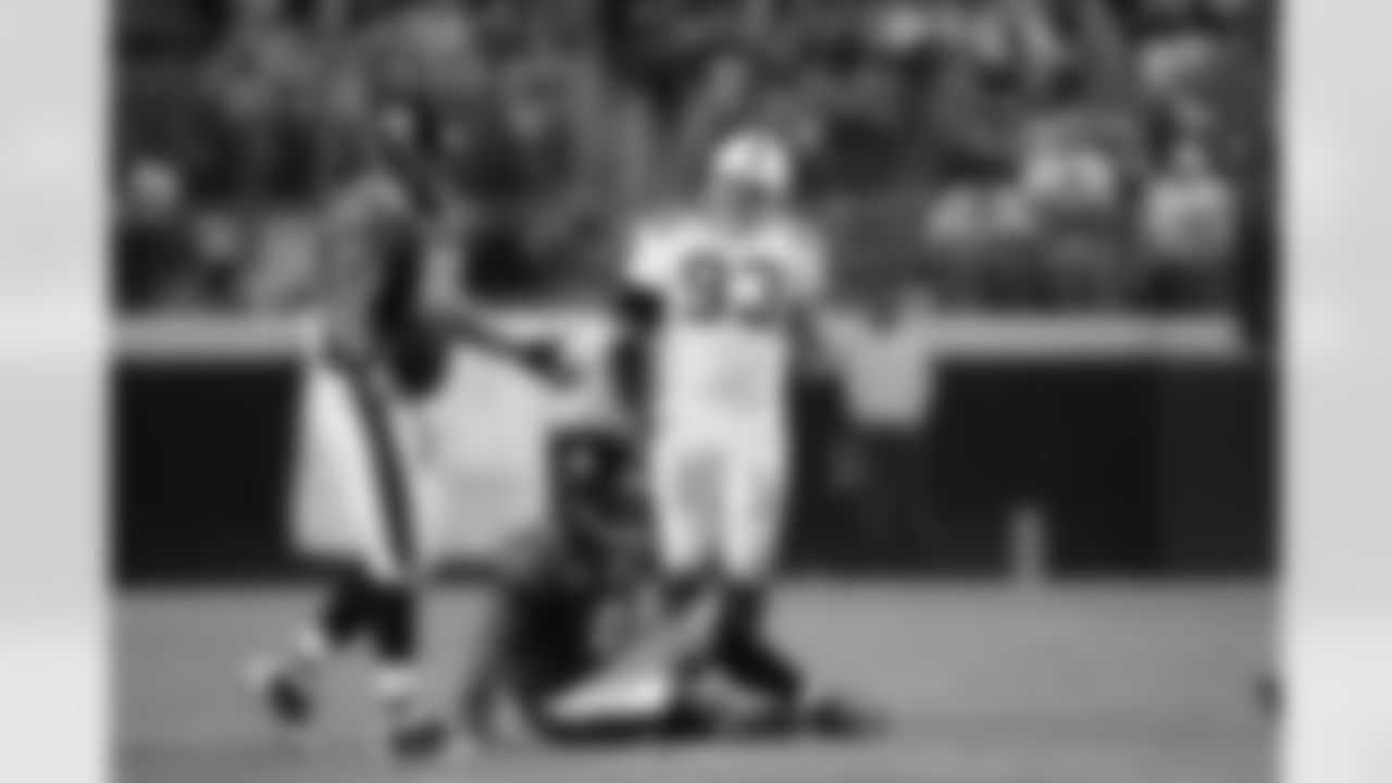 69 Khalif Barnes, #9 David Garrard