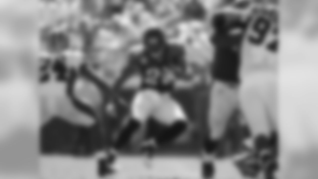 28 Fred Taylor, #79 Tony Pashos