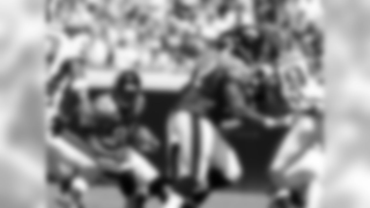 28 Fred Taylor, #62 Dennis Norman