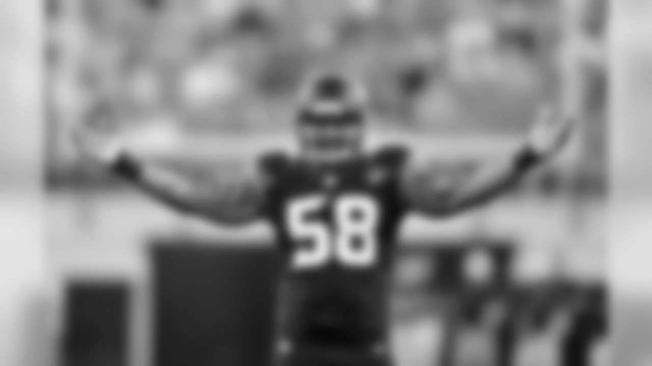 Jaguars LEO Jason Babin pumps on the crowd during the team's first preseason game, at home vs the Dolphins.