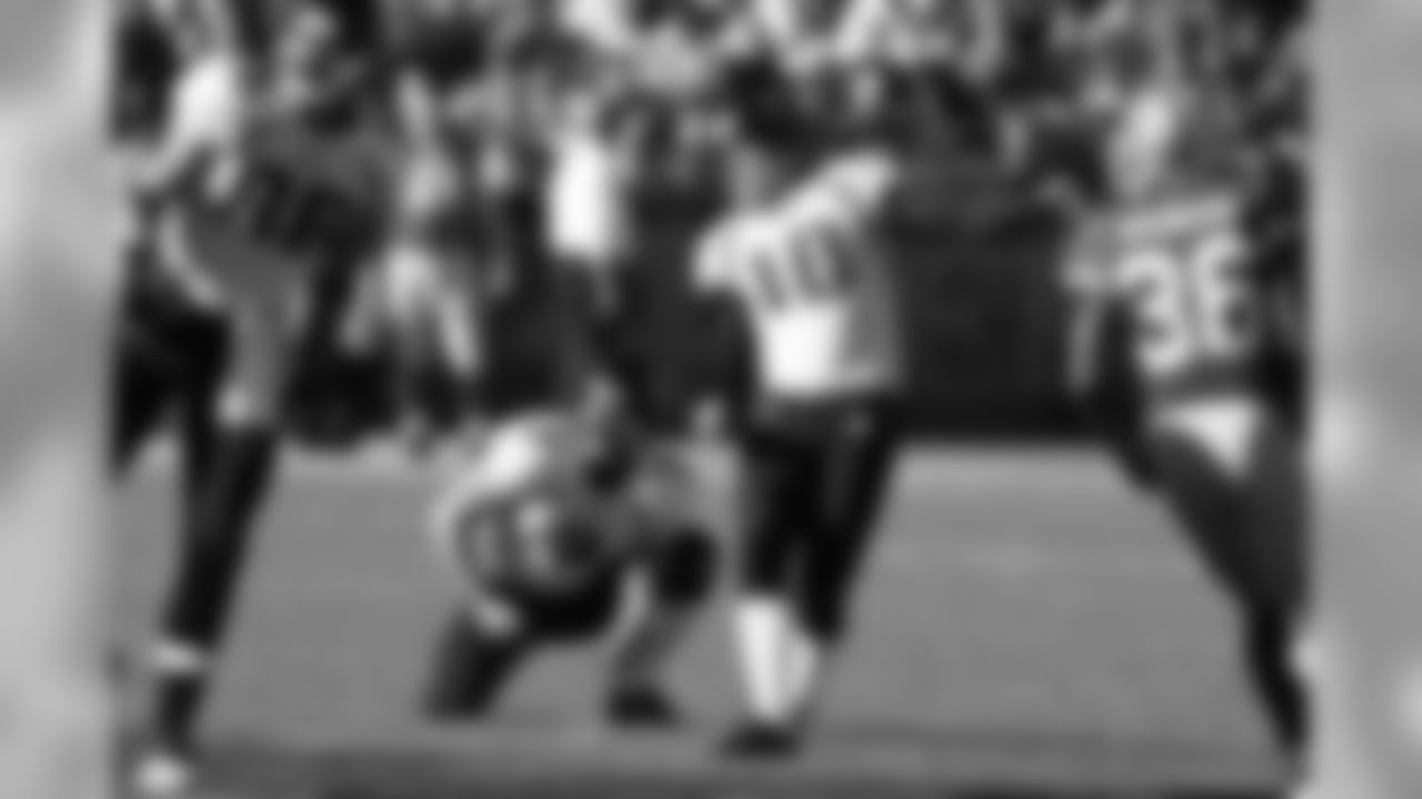 3 Adam Podlesh, #10 Josh Scobee