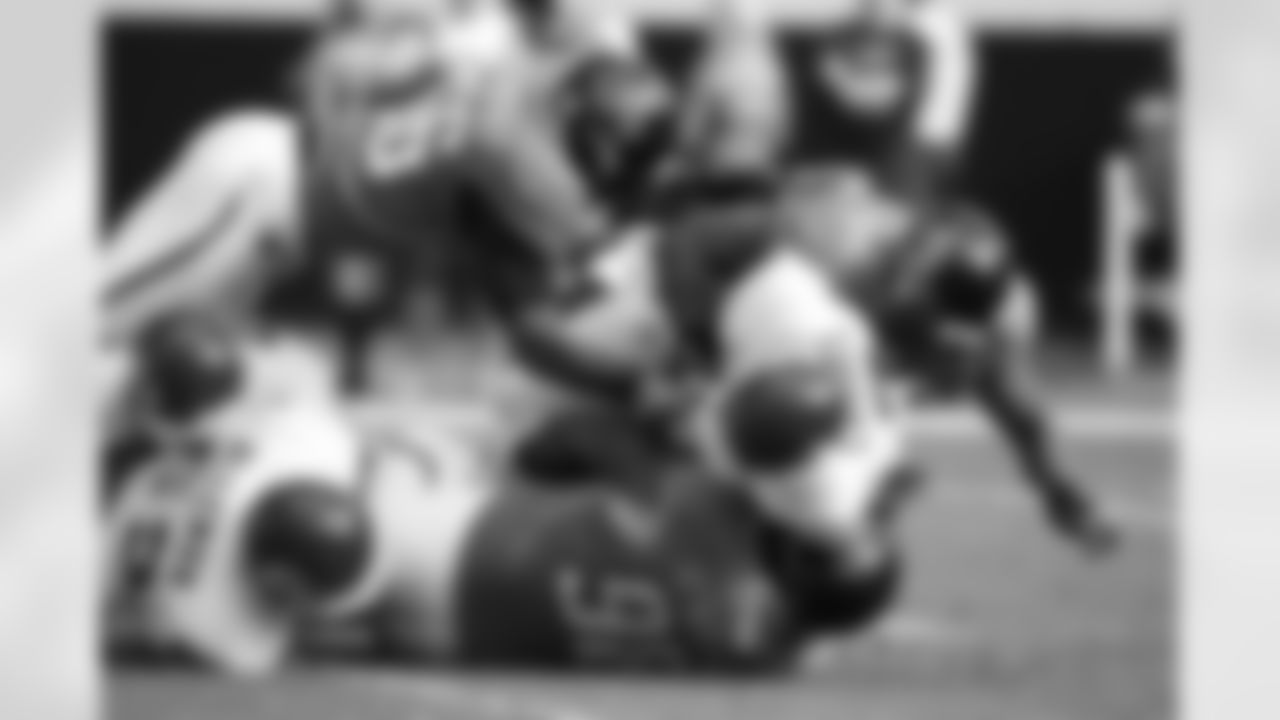 56 Justin Durant, #52 Daryl Smith, #98 John Henderson