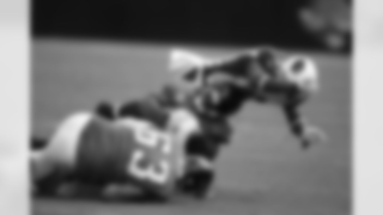 63 Brad Meester, #32 Maurice Jones-Drew