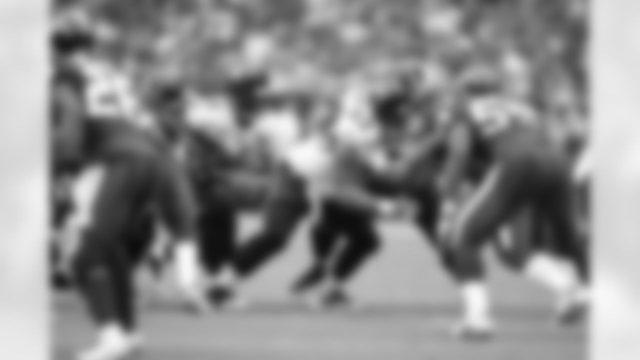 9 David Garrard, #63 Brad Meester