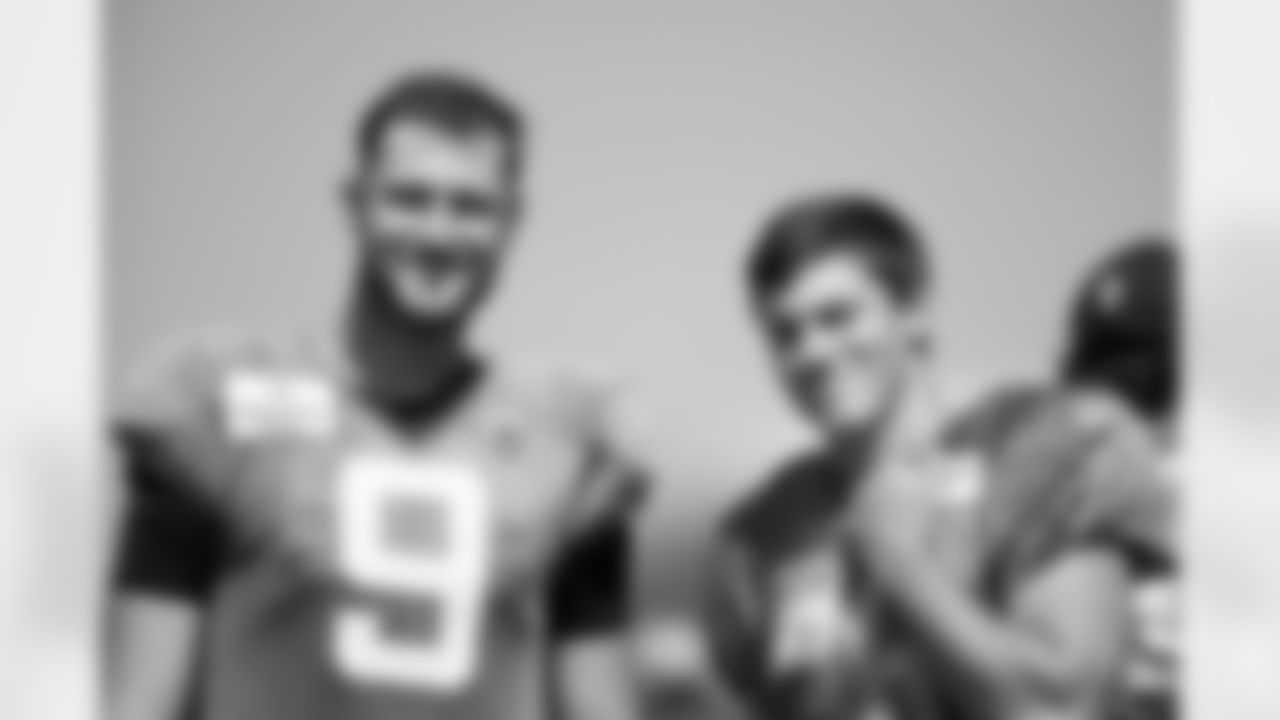 Jaguars P Logan Cooke (9) and Lions K Riley Patterson (36)