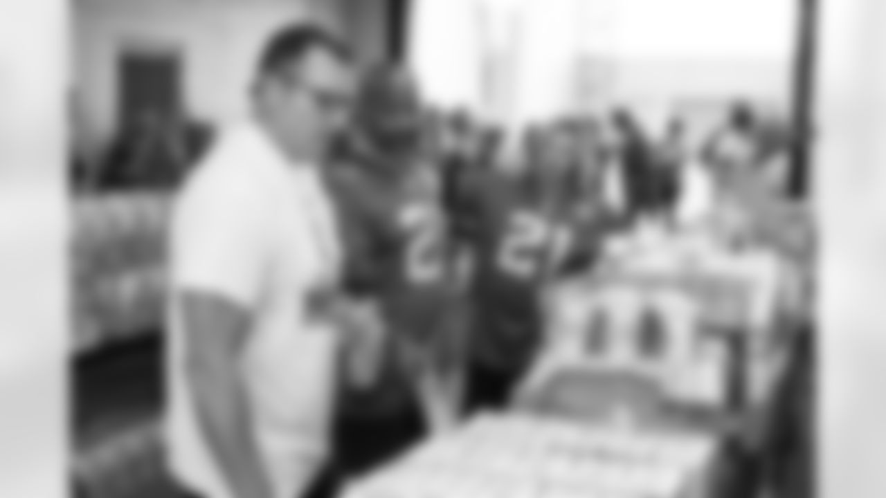 Nov. 4, 2021 - Novo Nordisk staff volunteer to stuff military care packages during Salute to Service month.