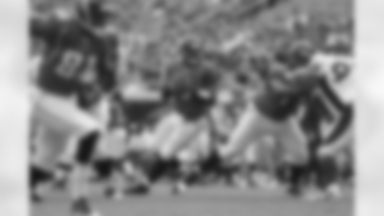 9 David Garrard, #77 Uche Nwaneri