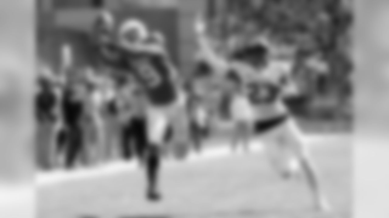 FILE - In this Oct. 13, 2018, file photo, Texas wide receiver Collin Johnson (9) makes a catch in front of Baylor cornerback Derrek Thomas (23) for 44-yard touchdown reception during the first half on an NCAA college football game, in Austin, Texas. A 10-4 finish with a big win in the Sugar Bowl energized Texas football to levels not seen in years. (AP Photo/Eric Gay)