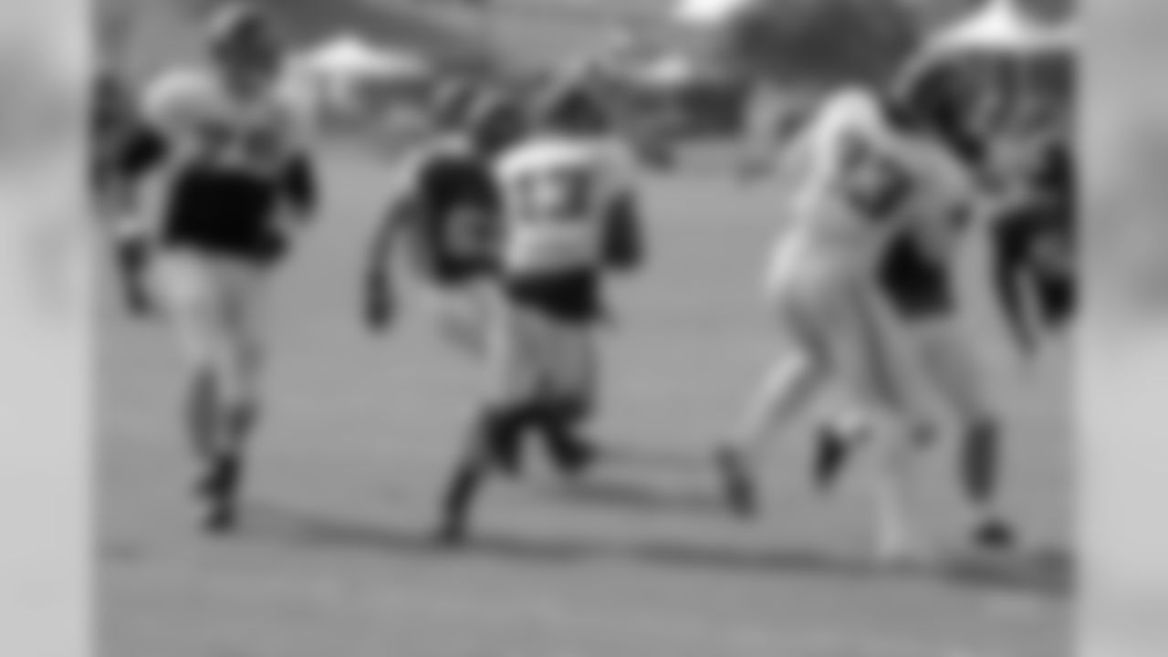 78 Jordan Black, #13 Clarence Denmark, #33 Greg Jones