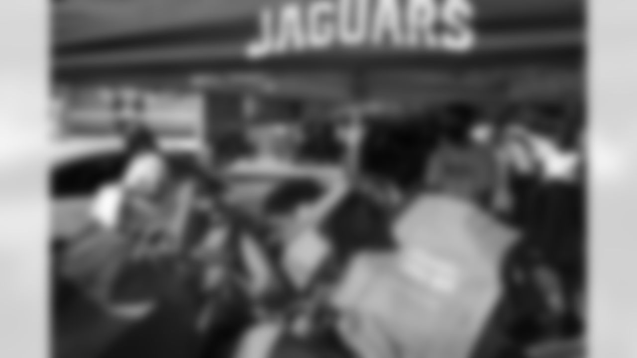 Jacksonville Jaguars former receiver Arrelious Benn and wife Mariel joined Jaguars Foundation manager of community relations Adriel Rocha for the Feel the Orgullo community food distribution event in honor of Hispanic Heritage Month, Tuesday, September 22, 2020 in Jacksonville, Fla. The event honored 10 local Hispanic high school scholarship recipients in lieu of the annual First Coast Hispanic Chamber Gala.