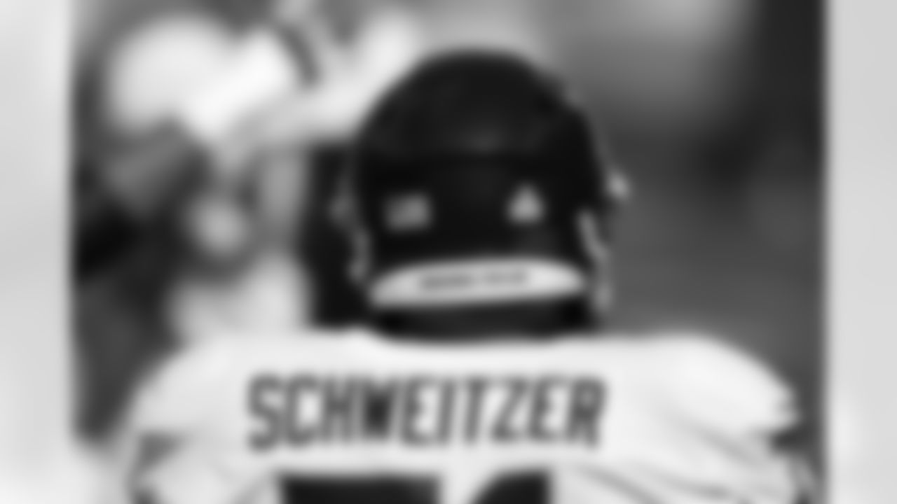 Washington Football Team offensive guard Wes Schweitzer (71) is seen with the name 'Breonna Taylor' and a 'Crucial Catch' sticker on his helmet before an NFL football game against the New York Giants, Sunday, Oct. 18, 2020, in East Rutherford, N.J. (AP Photo/Adam Hunger)