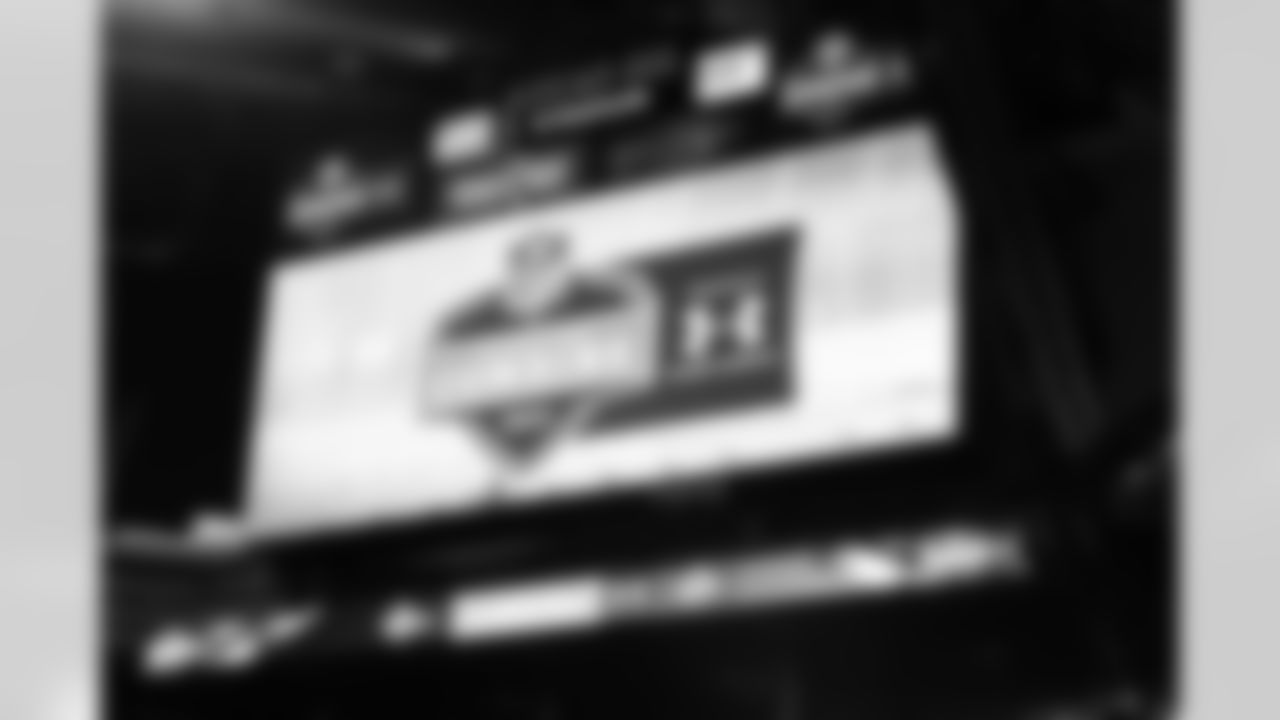 The scouting combine logo is shown on the score board