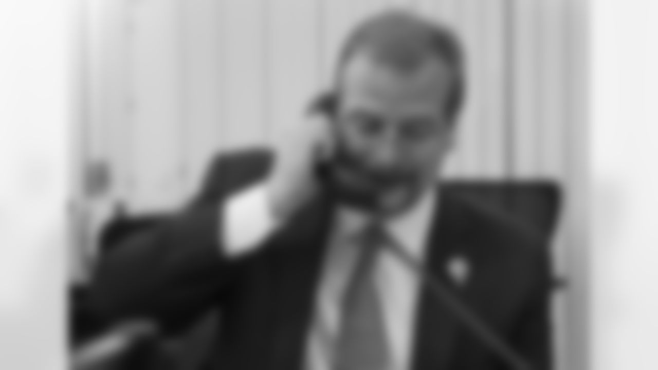 General Manager Mike Maccagnan Calls in the Pick During the First Round of the NFL Draft