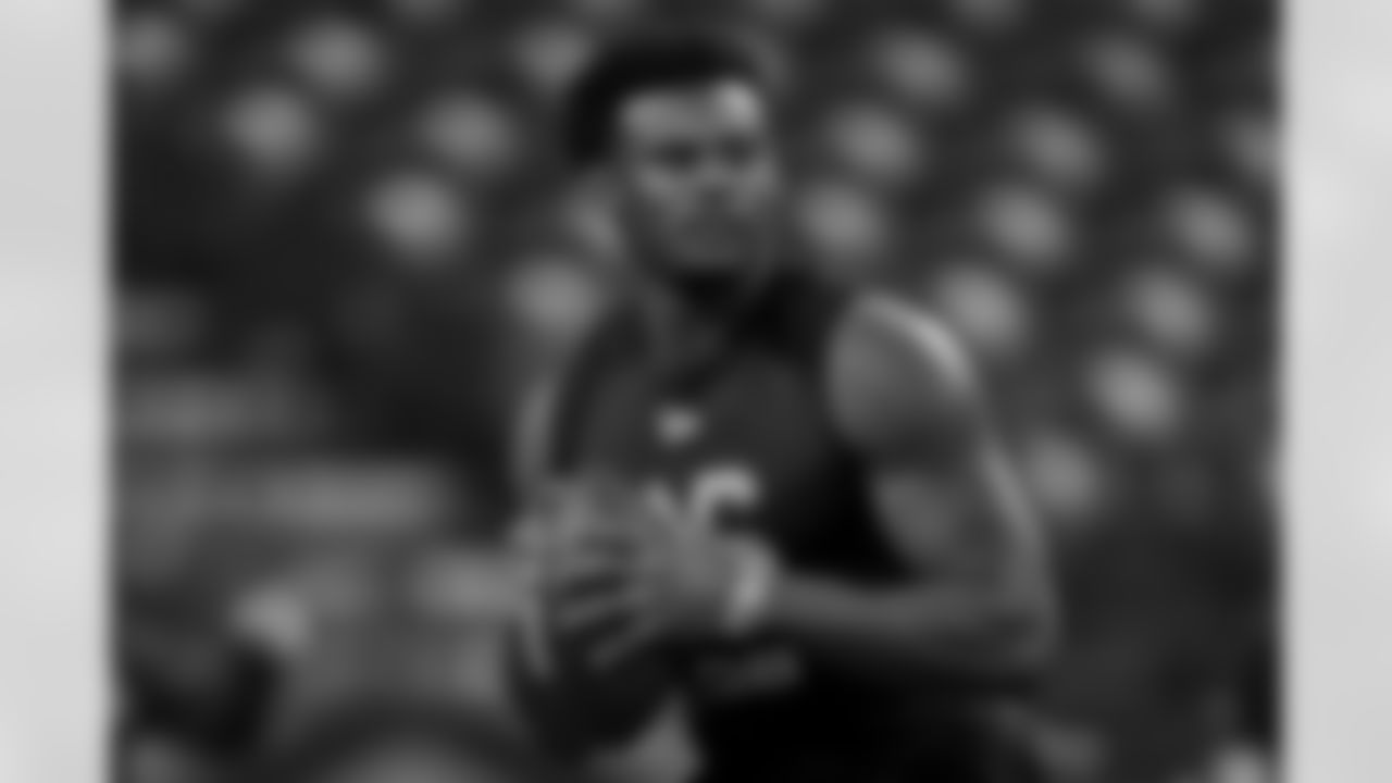 Liberty quarterback Malik Willis (16) prepares to throw the ball in a drill at the NFL football scouting combine in Indianapolis, Thursday, March 3, 2022. (AP Photo/Steve Luciano)
