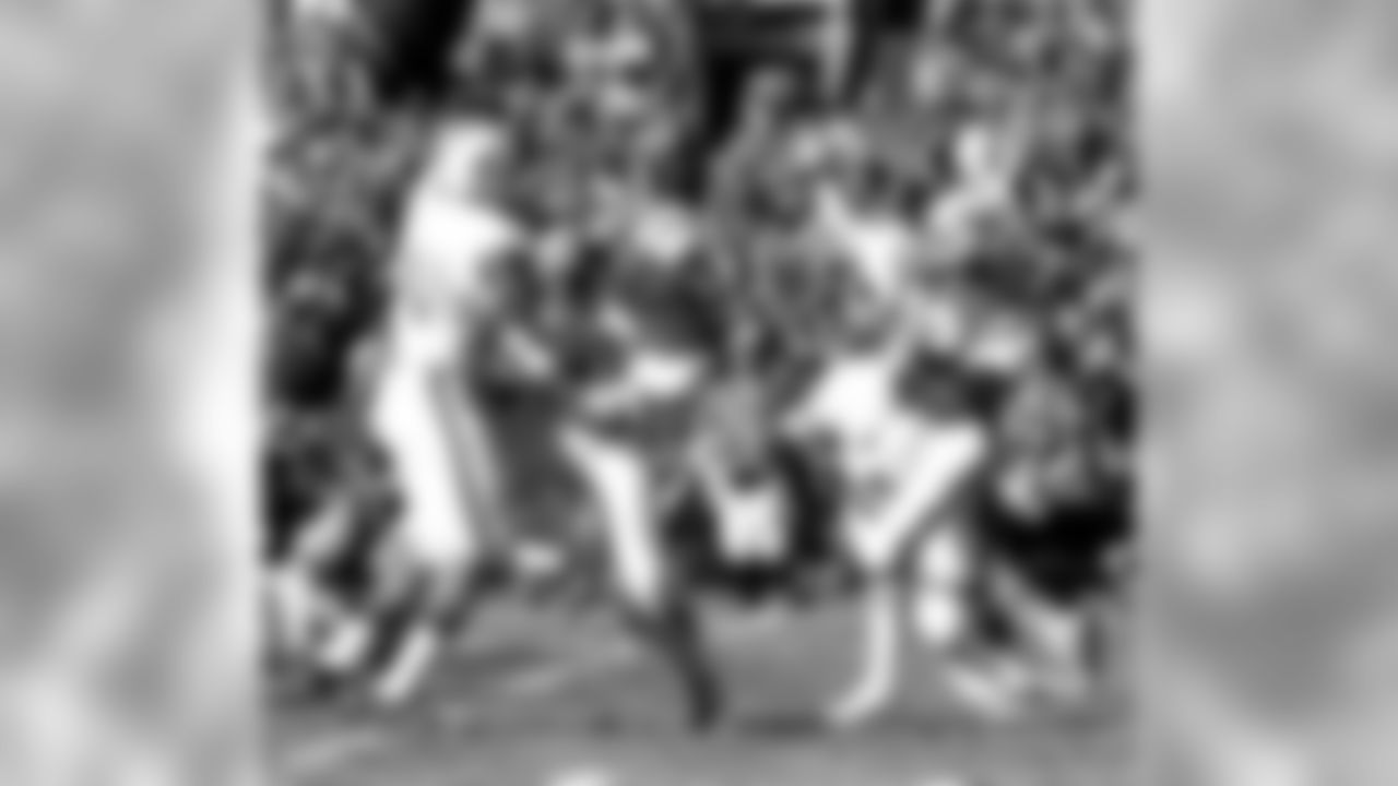 Hall of Fame quarterback Joe Namath of the New York Jets fires downfield during a 17-14 win over the Miami Dolphins on November 24, 1974 at Shea Stadium in New York, New York. Joe Namath - New York Jets - File Photos (AP Photo/NFL Photos)