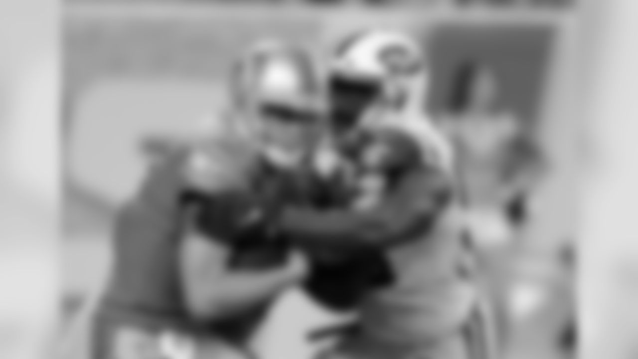 New York Jets linebacker Josh Martin (95) reaches in on Detroit Lions quarterback Jake Rudock (14) during the first half of an NFL preseason football game, Saturday, Aug. 19, 2017, in Detroit. (AP Photo/Jose Juarez)