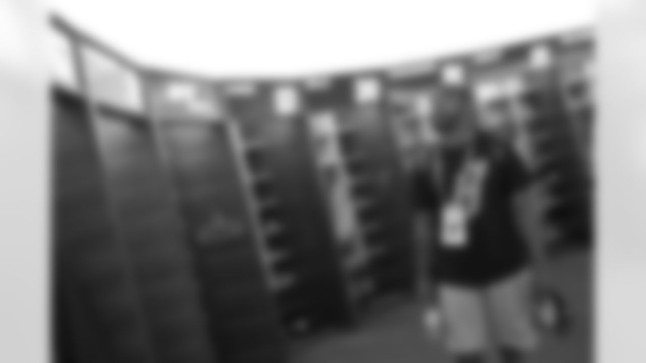 Tajh Boyd looks for his locker at AHJTC