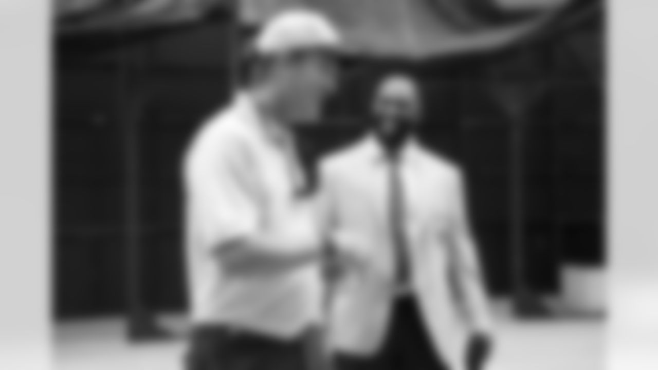 Hall of Fame inductee Darrelle Revis speaks with enshrinee Peyton Manning backstage during the Pro Football Hall of Fame Class of 2023 Enshrinement Ceremony on Saturday, August 5, 2023 in Canton, Ohio. (Ben Liebenberg/NFL)
