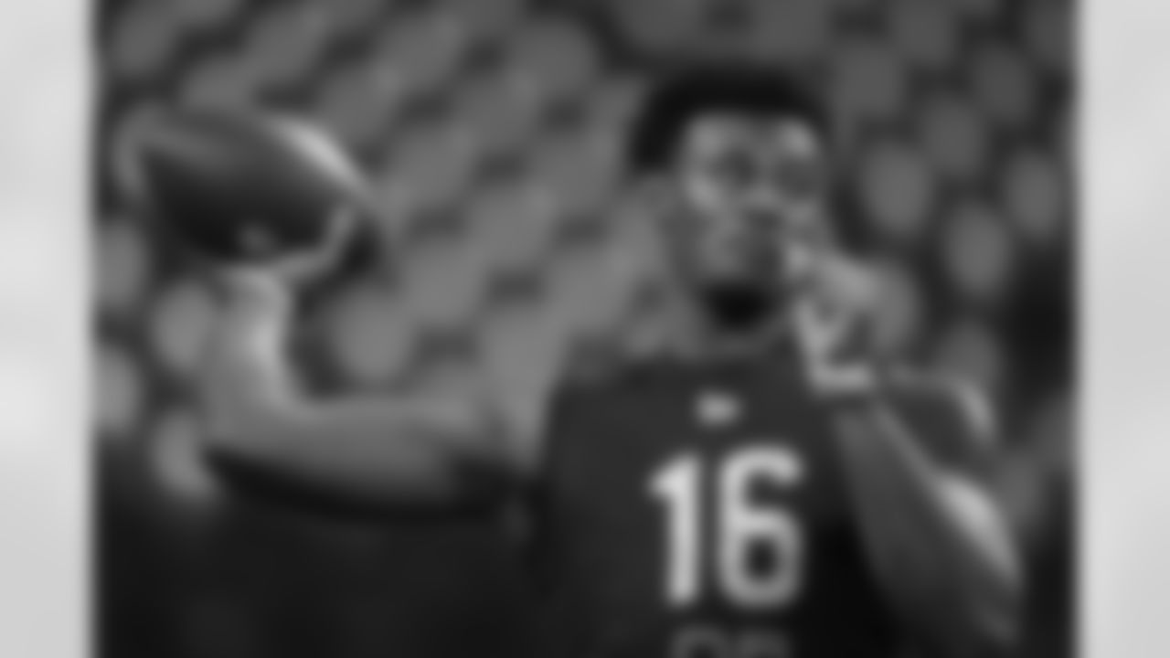 Liberty quarterback Malik Willis throws a pass during a drill at the NFL football scouting combine, Thursday, March 3, 2022, in Indianapolis. (AP Photo/Charlie Neibergall)