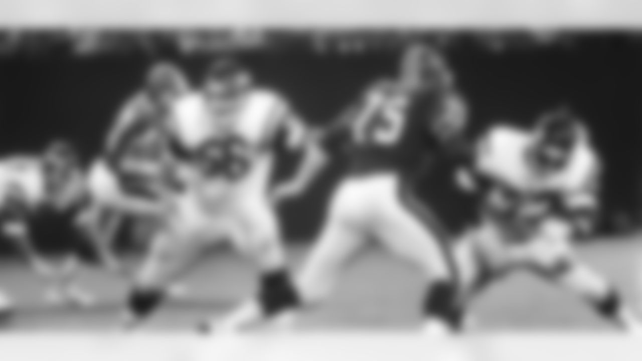 In the same 10/23/83 defeat, G Randy Rasmussen (No. 66) and T Chris Ward (No. 72) pass block for QB Chris Ward.