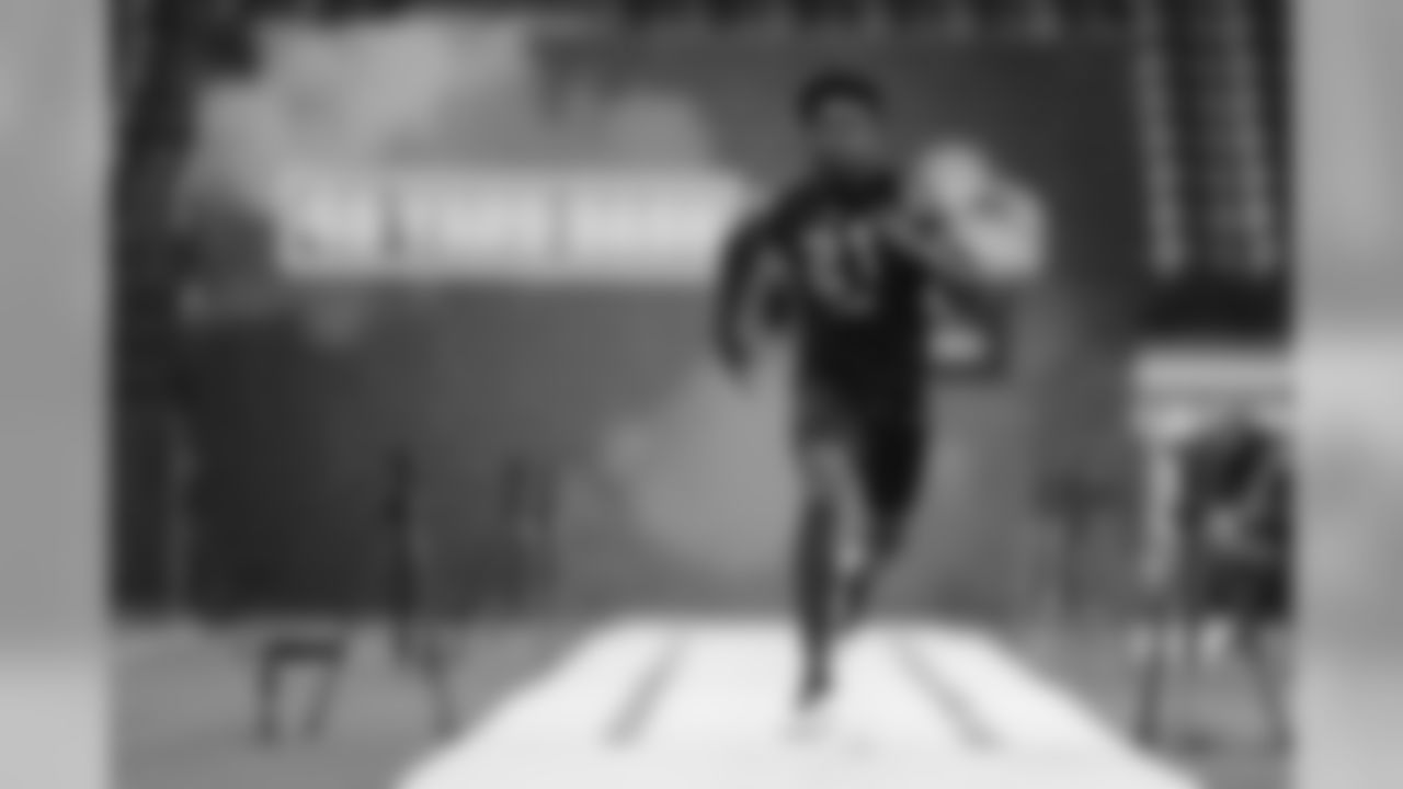 Utah defensive back Jaylon Johnson runs the 40-yard dash at the NFL football scouting combine in Indianapolis, Sunday, March 1, 2020. (AP Photo/Michael Conroy)