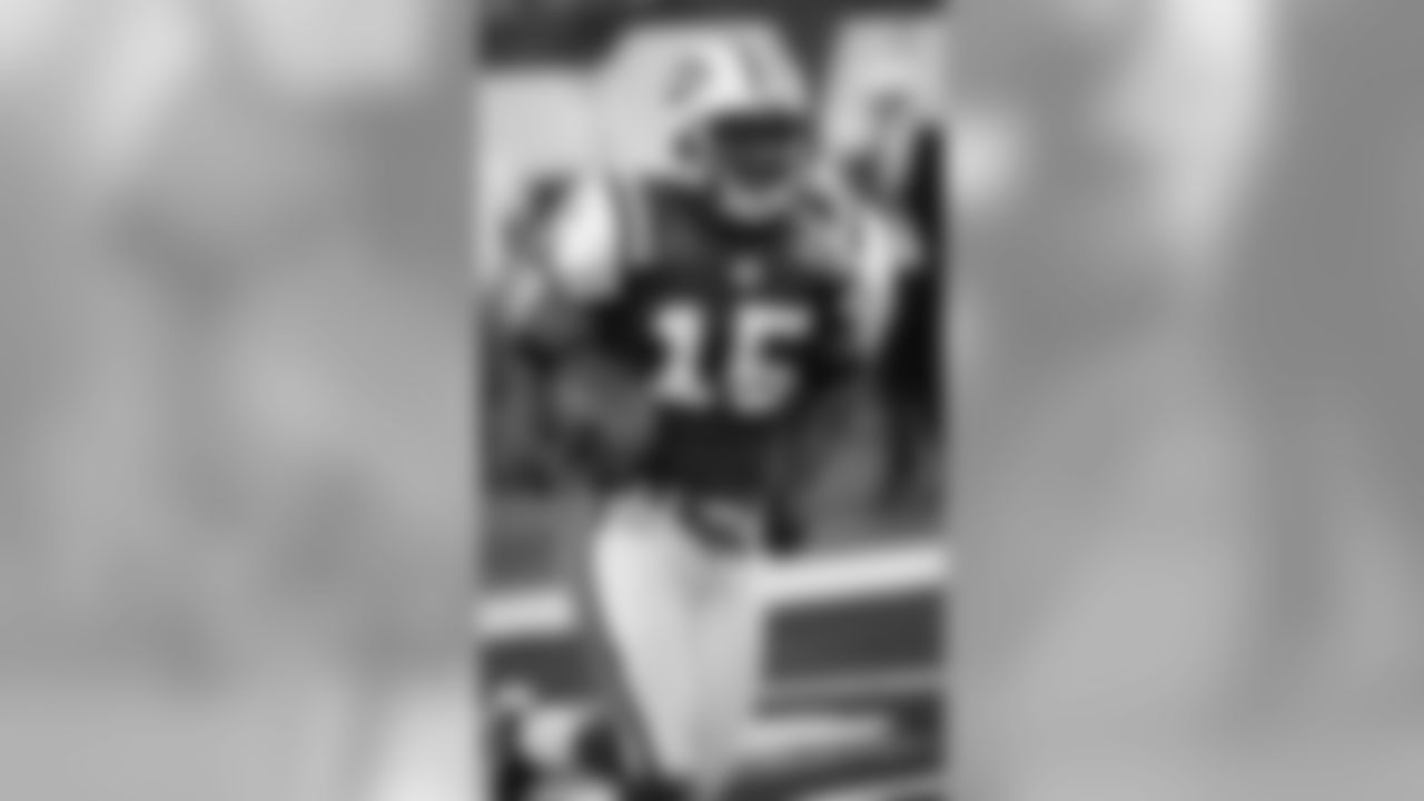 New York Jets' Larry Taylor warms up before the Jets preseason football game against the Washington Redskins at New Meadowlands Stadium in East Rutherford, N.J., Friday, Aug. 27, 2010. (AP Photo/Bill Kostroun)