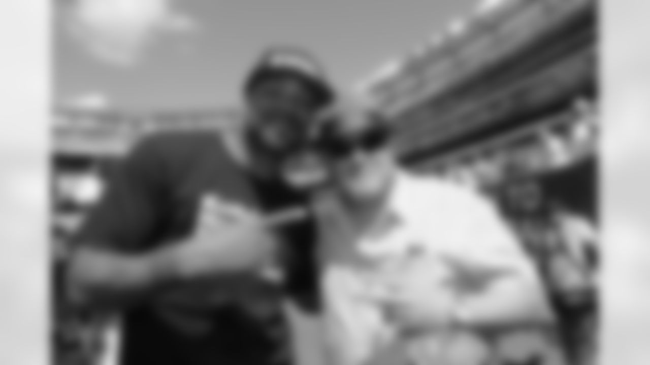Method Man and David Zayas, right, take in the pregame atmosphere of MetLife Stadium. Zayas was raised in the Bronx and was an officer of the New York Police Department before giving acting a shot.